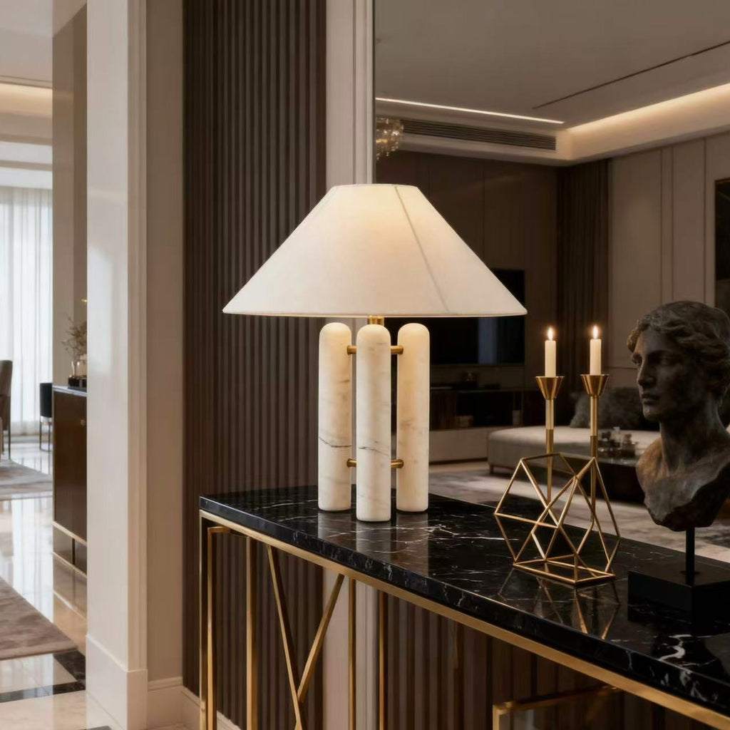 Travertine column lamp on bedside table - sculptural Art Deco design