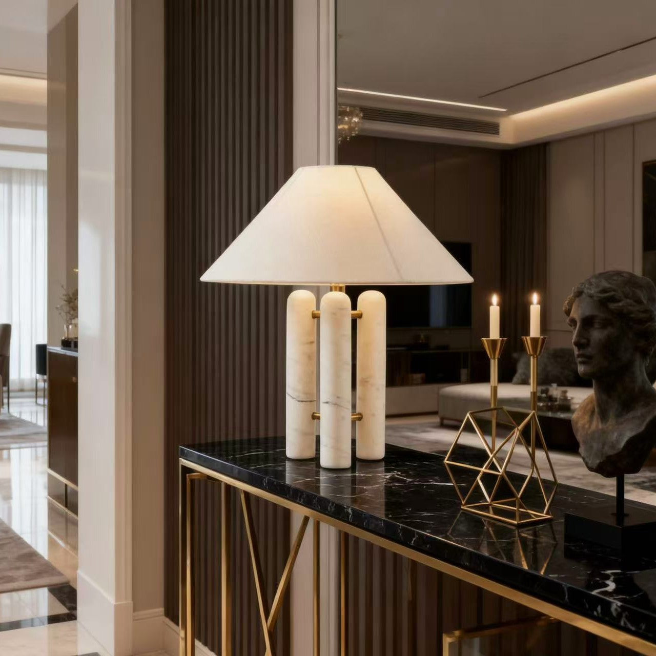 Travertine column lamp on bedside table - sculptural Art Deco design