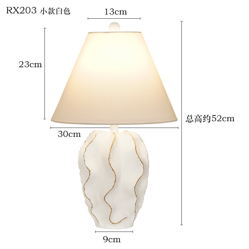 Sculptural Resin Wave Table Lamp base detail showing material finish - Neovall designer collection