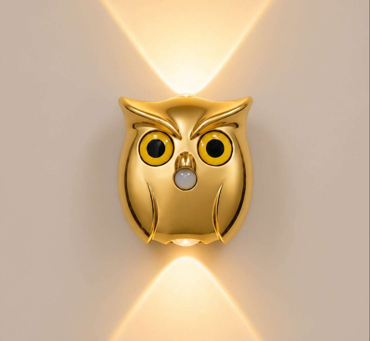 Gold owl wall light with motion sensor and warm ambient lighting